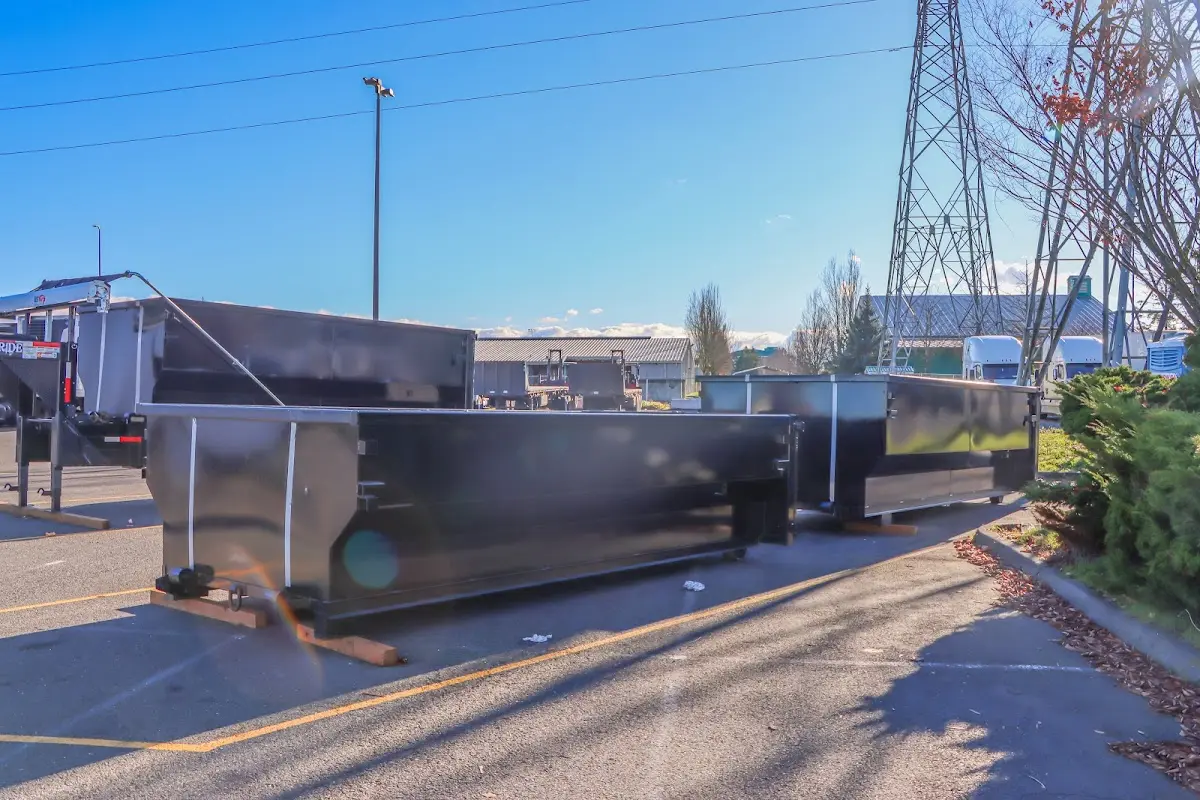 Roll-off dumpster ready for waste disposal at job site for 3 Yard Dumpster Rental in Lyndon